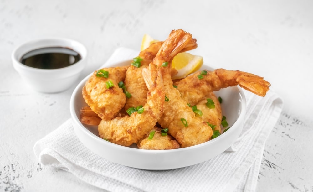 A view of a bowl of fried shrimp tempura