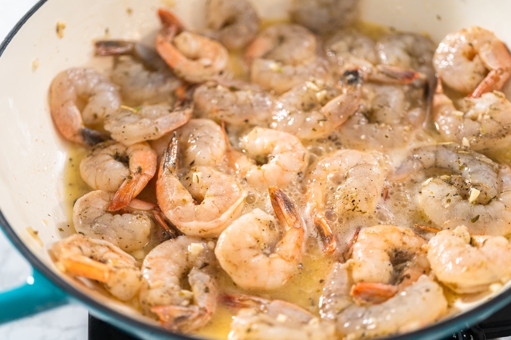 Frying Marinated Shrimp In A Cast Iron Frying Pan 