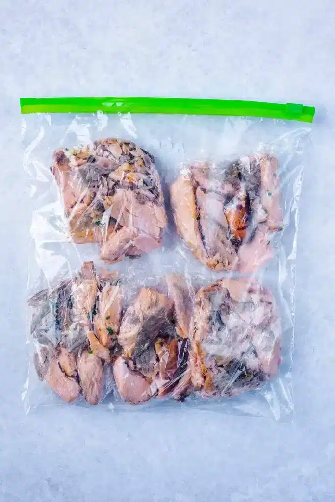 cooked salmon pieces in a plastic wrap