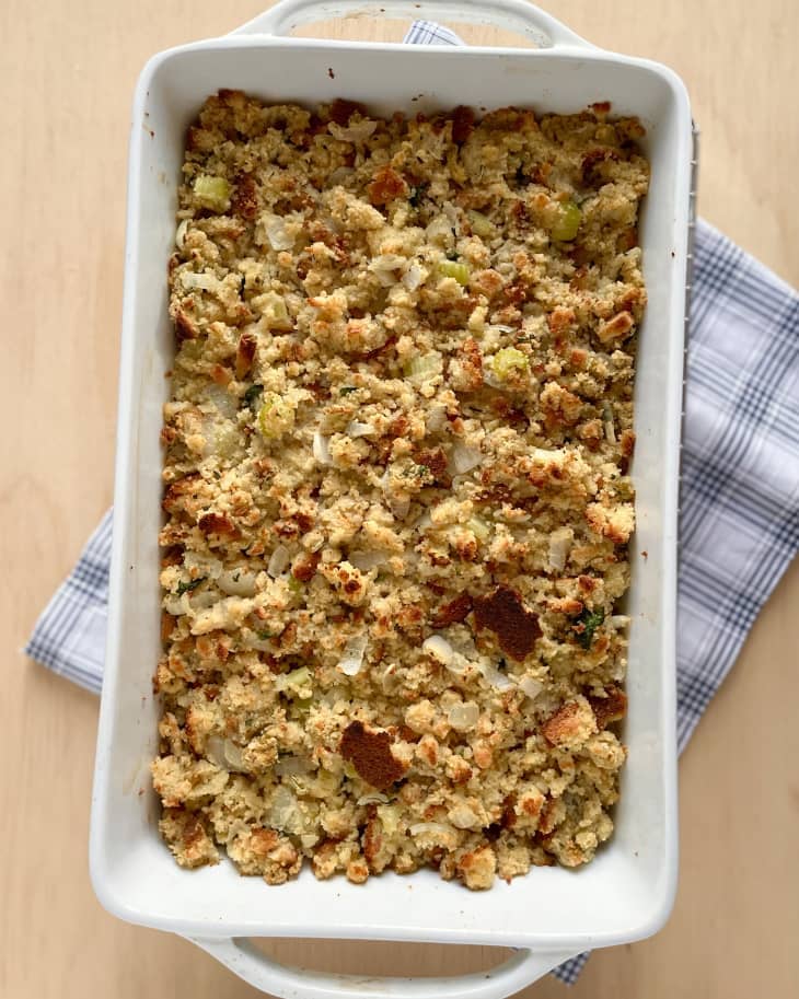 cornbread seafood dressing in a dish placed on a surface