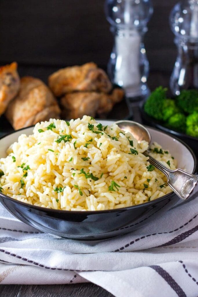 rice pilaf in a bowl with spoon