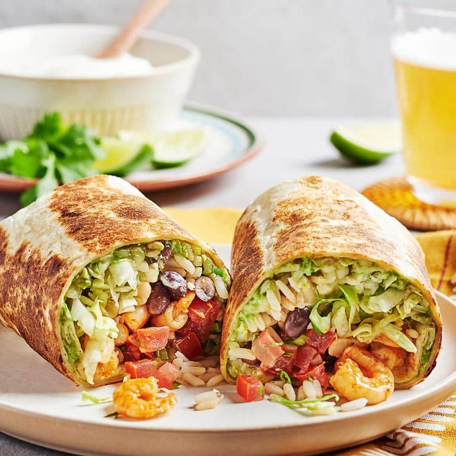 shrimp burritos and a lemon wedge