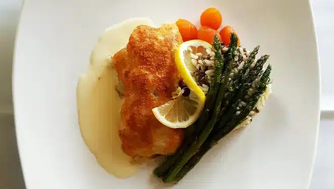 Baked Grouper with Parmesan Crust and top with lemon