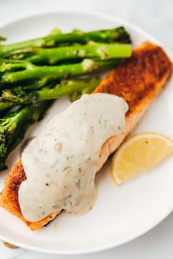 Grouper with Creamy Dill Sauce and served with lemon slice