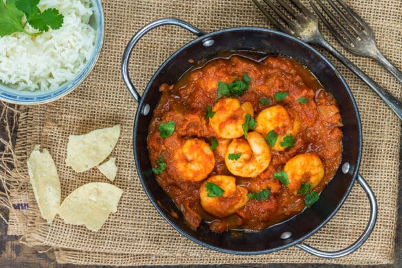 Zoomed view of shrimp masala in a cooking pan Zoomed view of shrimp masala in a cooking pan