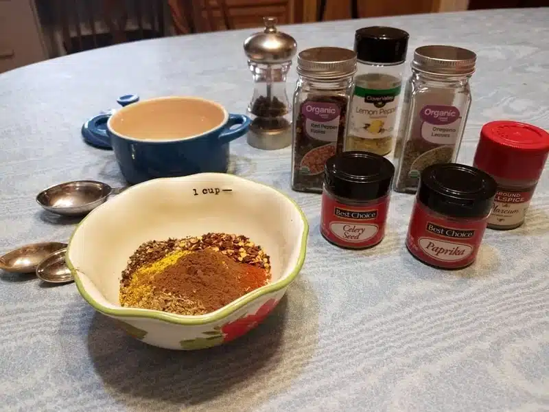 A collection of spices and seasonings for making a seafood seasoning mix A collection of spices and seasonings for making a seafood seasoning mix